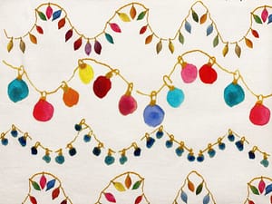 Light coloured fabric with strings of multicoloured party lights