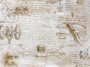 Parchment style fabric with DaVinci's handwriting notes on his inventions with drawings
