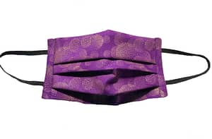 Purple fabric mask with overlapping gold metallic fireworks pattern