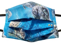 Blue fabric with undersea scene with various manatees